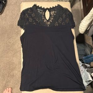 INC. Black top with lace cap sleeves and two button keyhole closure in back